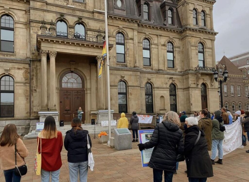 A group of protesters gather to raise awareness about climate change