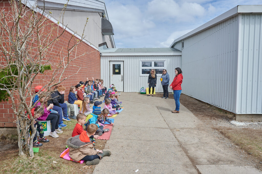 Guylaine introduces herself to a group of students