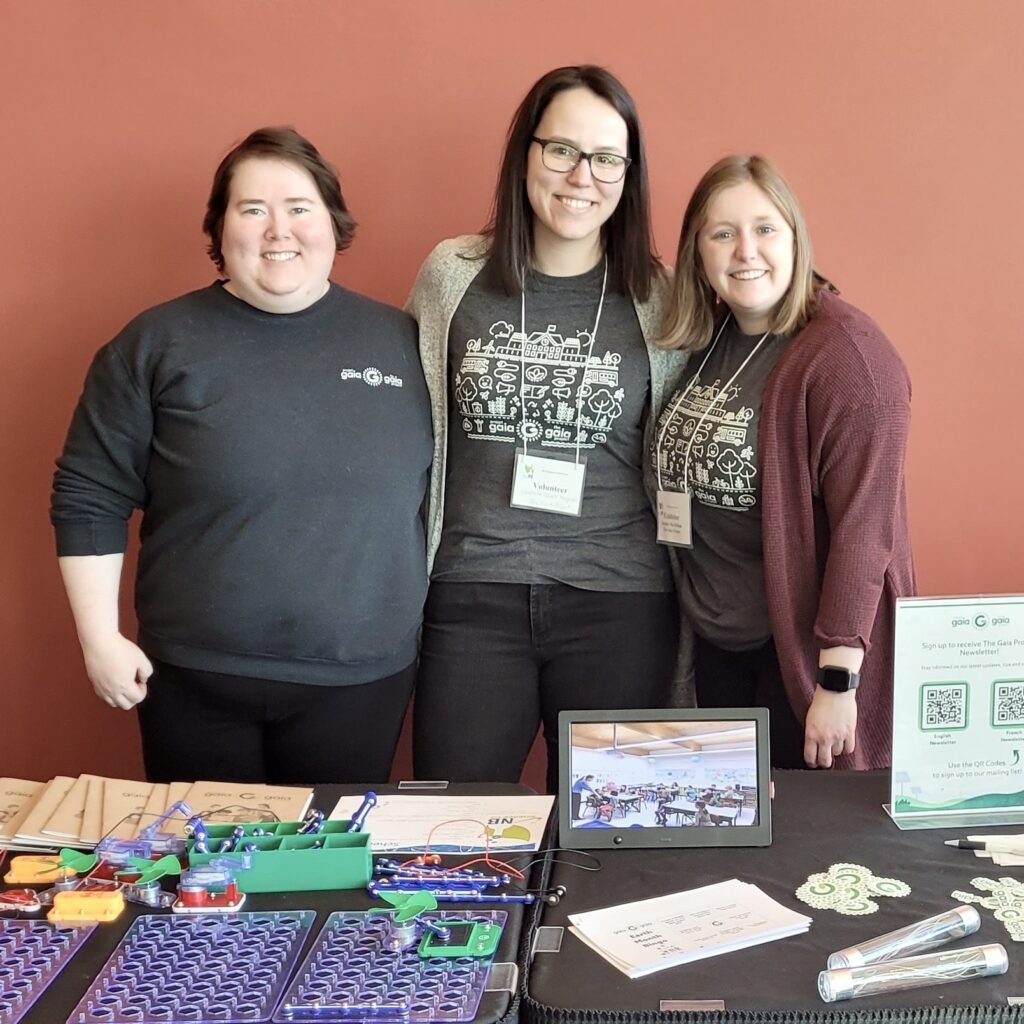 Gaia Project staff at an event booth 