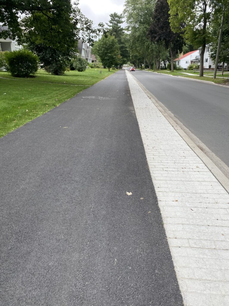 A photo of a clear, wide bike lane 
