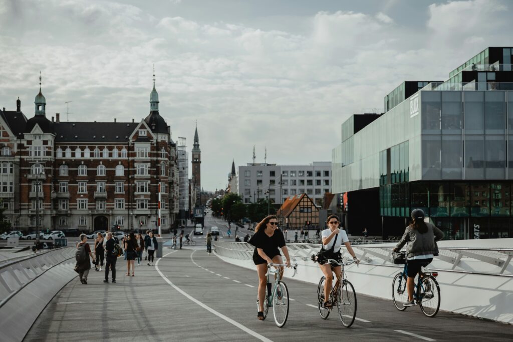 People biking and walking in a European city 